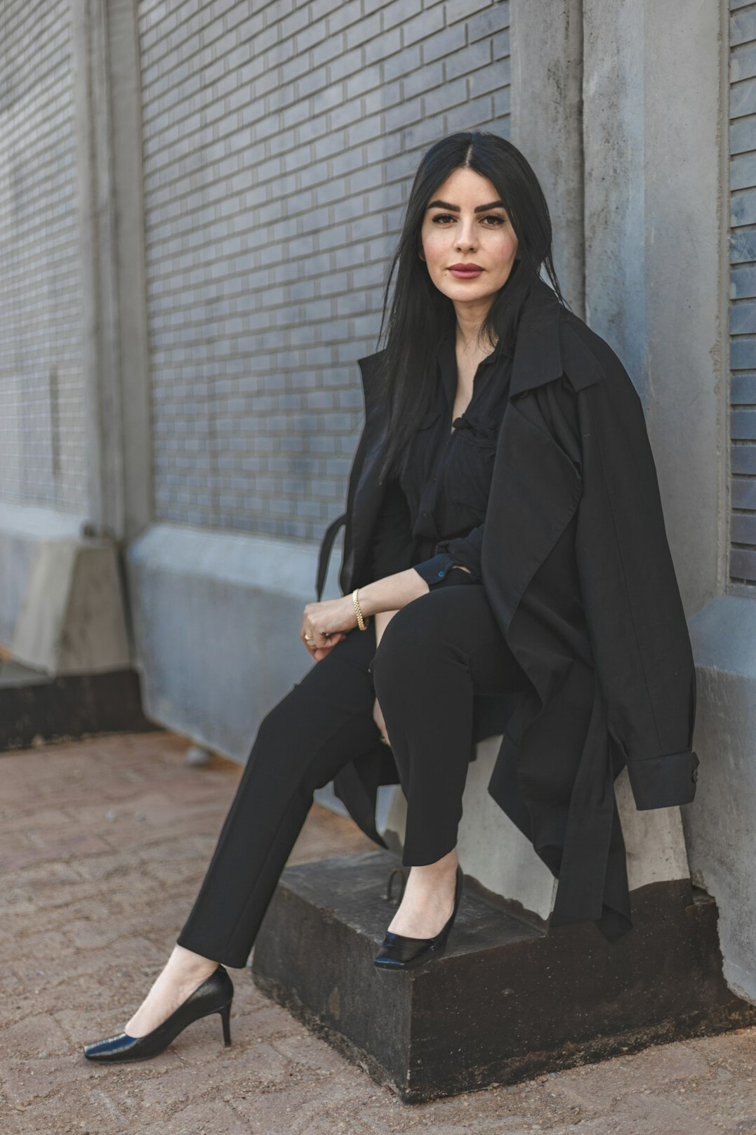Turkish woman in her 40s in business attire, professional portrait